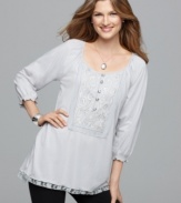 A peasant-style top, as pretty as can be, from RXB. Lace trim at the hemline gives it an extra feminine flourish!