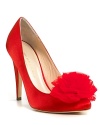 A fluffy tulle rosette adds irresistibly feminine style to sweet satin pumps from Loeffler Randall.