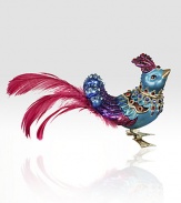 The fantasy of our animals are decorated and jeweled for the holidays. Adorn your tree with the sweet exotic bird in a brilliant blue with the shock of fuchsia tail feathers.GlassCrystalFeathersHandmade, hand-painted and hand-set6L X 3H X 1.5DImported