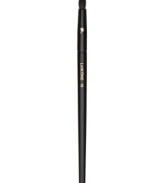 This brush is the ideal partner to all eye shadows. Designed with fine and densely packed fibers, this brush shades color and softens liner application around the lash line. Bristles are slightly more tapered for controlled detailing and blending. How to use: Use the tip of the brush to softly diffuse liner at the base of the lash line for a soft, smoky effect. For highlighting, use the tip of the brush with shimmer shadow on the inner corner, ball of the eye, or under the brow.