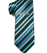 Create a little cool contrast with the concrete jungle with this striped skinny tie from Alfani RED.