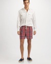 A quick-dry swim classic ideal for everyday swims and holiday jaunts alike, crafted with a standard fit and preppy plaid checks. Drawstring elastic waist Logo embroidery Side slash, patch pockets Mesh lining Inseam, about 4¾ 52% cotton/48% nylon; machine wash Imported 