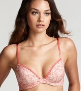 An abstract printed underwire bra with ornate scalloped edge trim from Calvin Klein.