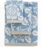 Sweet serenity. Offering a romantic and elegant composition for your bath space, this Aquarelle washcloth features pretty blooms in soft blue hues.