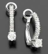 A cascade of round-cut diamonds (3/8 ct. t.w.) that ends on a bright note. Diamond earrings set in 14k white gold.