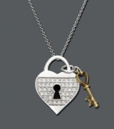 A perfect blend of silver and gold, this heart lock and key pendant is sure to melt her heart. Necklace features an 18k gold key charm and a sterling silver and round-cut diamond (1/5 ct. t.w.) encrusted heart lock. Approximate length: 18 inches.  Approximate drop: 7/8 inch.