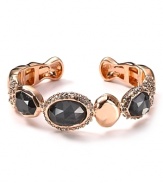 Boldly embellished with white quartz and Swarovski crystals, Alexis Bittar's rose gold-plated cuff is an extra with edge. Resist the urge to stack -- this trendsetting bijoux is best worn solo.