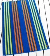 Lounge on the beach or by the pool with this Samoa Stripe beach towel from Lauren by Ralph Lauren, featuring classic stripes in a vibrant palette.