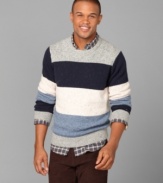 Perfect blocking. Make a few bold moves in this color-blocked sweater from Tommy Hilfiger.