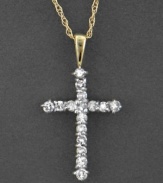 Always a gift of exquisite taste and meaning, this diamond necklace (1/4 ct. t.w.) features a cross pendant comprised of diamonds set in 14k gold.