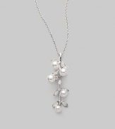 From the Olive Collection. Delicate, dangling boughs of 18k gold, with diamond leaves and white Akoya pearl olives on a graceful gold chain. 5mm-6.5mm white round cultured pearls Quality: A+ Diamonds, 0.24 tcw 18k white gold Chain length, about 18 Pendant drop, about 1¾ Spring ring clasp Imported