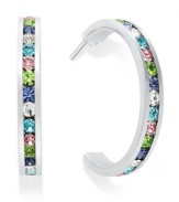 Traditions gives a sparkling boost to a simple pair of hoop earrings. A channel-set row of round-cut multicolored crystal with Swarovski elements shines within a sterling silver setting. Earrings feature a post and stud backing. Approximate diameter: 3/4 inch.