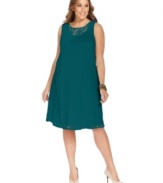 Get set for the holiday party circuit with Cha Cha Vente's sleeveless plus size dress, fashioned from alluring lace.