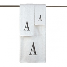 Monogram letter towels: A classic and sophisticated look, this monogrammed collection features a soft, plush oversized 100% combed cotton loop terry towel made of the finest quality materials. Choose from a white towel with a silver metallic embroidered letter of your choice in Bodoni font or an ivory towel with a brown embroidered letter of your choice in Bodoni font. All letters available A - Z.