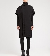 Sculptural and modern, finished with unique cape sleeves and side slash pockets.Funnel collarShort cape sleevesAsymmetrical concealed button frontSide slash pocketsAbout 42 from shoulder to hem97% cotton/3% spandexDry cleanMade in Italy of imported fabricModel shown is 5'10½ (179cm) wearing US size Small. 