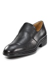 A handsome leather loafer with side gore closure, slightly stacked heel and Bally logo embossed at the upper and sole.