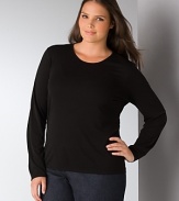 Eileen Fisher's black silk jersey top is an essential piece to build your looks upon. Layer it under dresses or under your favorite knits. Scoopneck, long sleeves