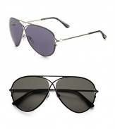 Classic aviators in lightweight metal with unique criss-cross detail. Available in shiny black frames with smoke green lenses and shiny rhodium frames with blue lenses. 100% UV protective Made in Italy 