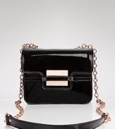 In slick patent leather and rosegold hardware, this modern shoulder bag is a chic haven for storing the essentials. From Z Spoke Zac Posen.