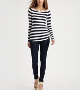 Bold sailor stripes lend graphic appeal to this sleek stretch knit.Contrast boatneck with button detailsLong sleevesShirrtail hemPullover styleAbout 26 from shoulder to hem96% rayon/4% spandexDry cleanMade in USAModel shown is 5'9 (175cm) wearing US size Small.