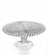 The Swirl cake stand steals the spotlight at casual tables with fluted detail, beaded trim and a look of antique grace. From Martha Stewart Collection.