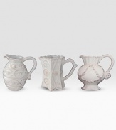 Bring the outdoors inside with a charming set of three smaller, hand-finished stoneware pitchers beautifully detailed with mismatched scrolling designs that celebrate the splendor and romance of the world's most beautiful gardens. Chip resistant Each, 3½ high Dishwasher safe Imported