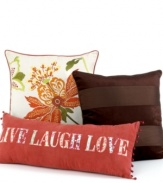 Martha Stewart Collection lends modern sophistication to this decorative pillow, featuring a floral design in an array of earthy hues.