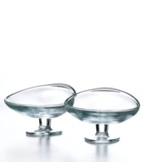 Put dessert on a pedestal. Featuring luminous glass in a funky footed silhouette, the Gourmet Split ice cream bowls from French Home elevate sundaes to enticing new heights.