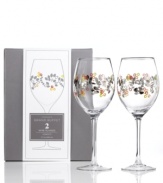 Ready for celebration, this set of Charter Club's Novelty Confetti wine glasses combines a simply beautiful shape with colorful rings and shimmering garland for a look that's fun yet refined.