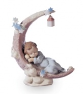 A sleepy little angel snoozes under the stars, in the crook of a crescent moon, in this handcrafted Heavenly Slumber figurine by Lladro. Cute for a child's bedroom.