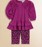 A charming, two-piece set pairs a ruffled, bow-adorned top with matching leopard print leggings. Top CrewneckLong puff sleevesBack snapsRuffled hemLeggings Elastic waistbandHoodie: CottonLeggings: 96% cotton/4% spandexMachine washImported