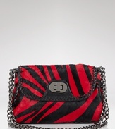 Red zebra haircalf puts an exotic spin on this sophisticated shoulder bag from Badgley Mischka.