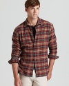 A striking flannel shirt lends a masculine edge to your casual cool look. From Vince.