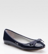 Patent leather staple with grosgrain trim and a delicate bow. Patent leather upperLeather lining and solePadded insoleImported