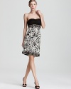 An intricately pleated bodice tops off a richly embellished skirt on this Sue Wong strapless dress.