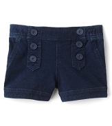 Nautical-inspired decorative buttons and sailor girl styling elevates these adorable denim shorts from GUESS Kids.