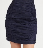 THE LOOKHigh waisted design Side zip closure Two ruched seams on front and back Mock pleats on front and back middle panel Fully linedTHE FITAbout 20 longTHE MATERIALSkirt: 89% cotton/11% rayon Lining: AcetateCARE & ORIGINDry clean Made in USA