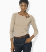 Lauren Ralph Lauren's figure-flattering petite boatneck top rendered in soft cotton is accented with a double buckle at the shoulder for a hint of rustic edge.