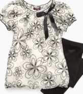 Sparkly flowers and a bubble shape make this cute Tempted tunic and leggings set totally groovy.