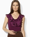 Two layers of sultry ruffles lend feminine appeal to a sleek jersey sleeveless top.