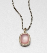 From the Noblesse Collection. A pretty pink mother-of-pearl cabochon surrounded by brilliant diamonds on a sterling silver box chain. Pink mother-of-pearlDiamonds, .3 tcwSterling silverLength, about 17Pendant size, about .47Lobster clasp closureImported 