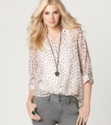 A vintage-inspired floral pattern on semi-sheer fabric lends chic charm to this top from Buffalo Jeans.