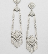 A long and elegant piece encrusted in pavé crystals. CrystalsRhodium-plated brassLength, about 2.5Post backImported 