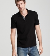 Classic fit polo in soft cotton, accented with contrast placket lining.