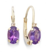 Sparkling perfection. Add a vibrant pop of color to your look with oval-cut amethyst (3/4 ct. t.w.) and sparkling diamond accents. Crafted in a 14k gold leverback setting. Approximate drop: 3/4 inch.