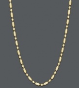 Dazzle your neckline with a little extra texture. Necklace features a unique dot dash design crafted in 14k gold. Approximate length: 24 inches.