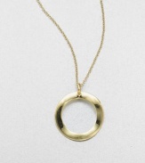 A radiant 18k gold circle pendant with a wavy design on a link chain. 18k goldLength, about 16-18 adjustablePendant size, about .8Lobster clasp closureImported 