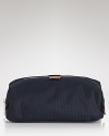 Jack Spade offers up a minimalist dopp kit with a zip top, leather details and interior zip compartments to store all of your travel toiletries.