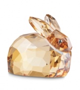 Sparkly rabbit. The Swarovski hare figurine has a faceted crystal fleece and golden brown hue that's sure to warm any collector's heart.