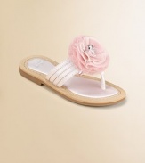 Not for the beach, these party flip flops are graced with soft tulle rosettes for a fun, festive look.Terylene satin upperThong front with multi straps across the middleComposite rubber solePadded insoleFaux leather liningImported